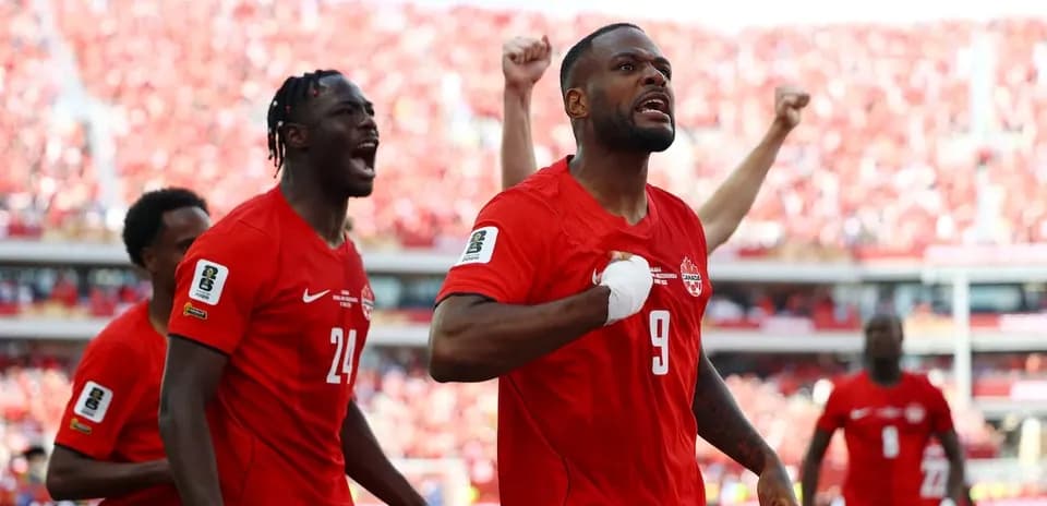 Canada players celebrating a goal during match