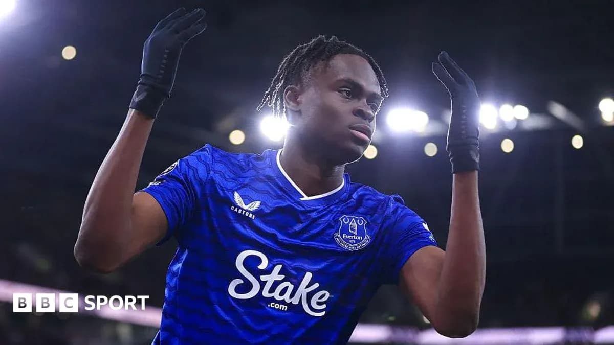 Player celebrating in Everton jersey during match