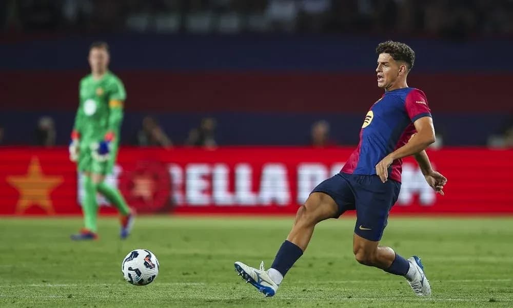 Player kicking the ball during a football match
