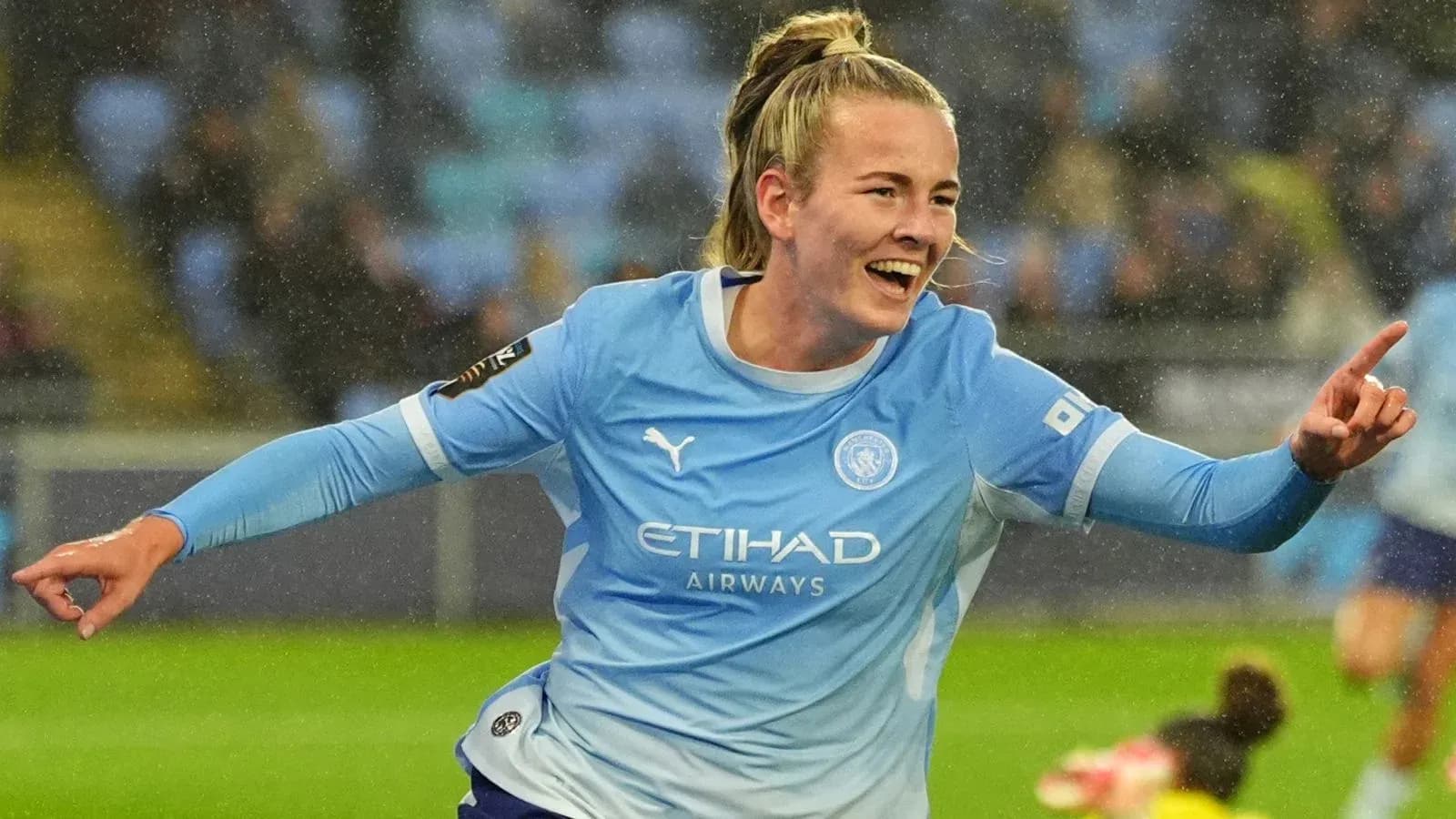 Player celebrating after scoring a goal for Manchester City