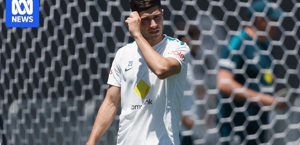 Player adjusting his hair during training session