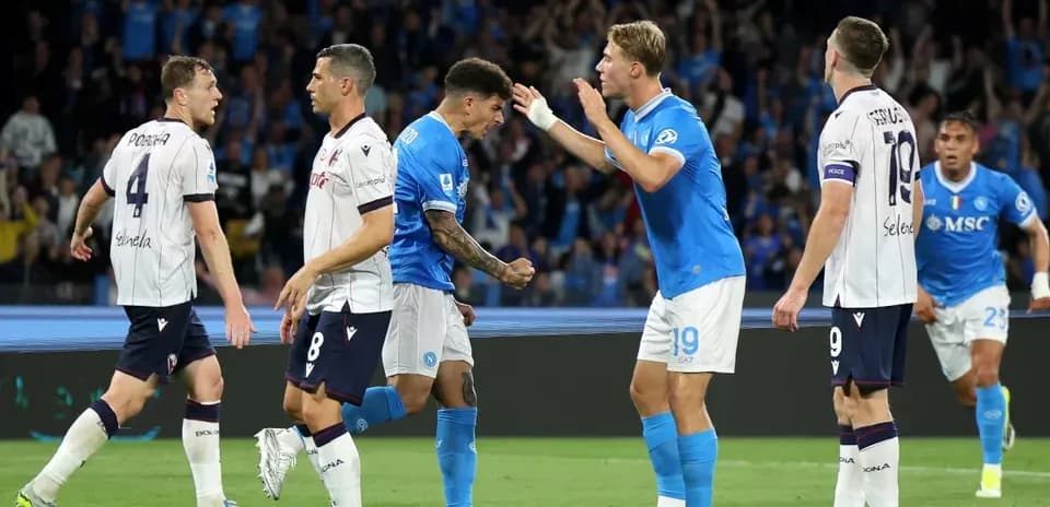 Napoli players celebrating a goal against Bologna