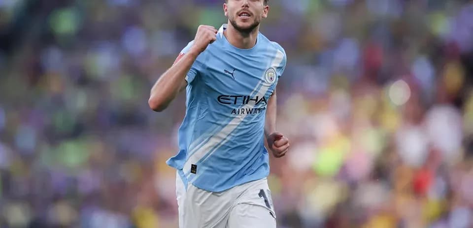Player celebrating during a Manchester City match
