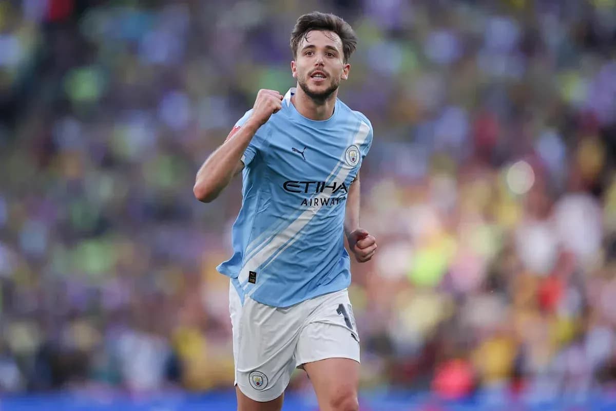 Player celebrating during a Manchester City match
