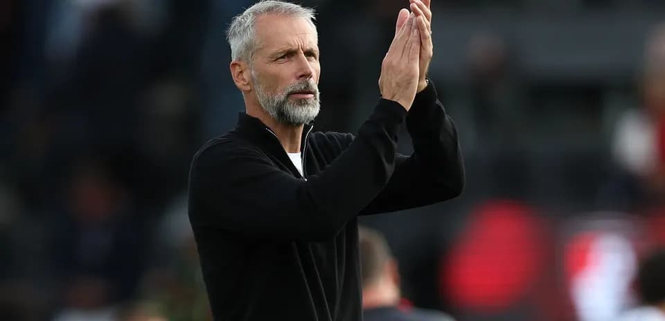 Coach applauding during a match