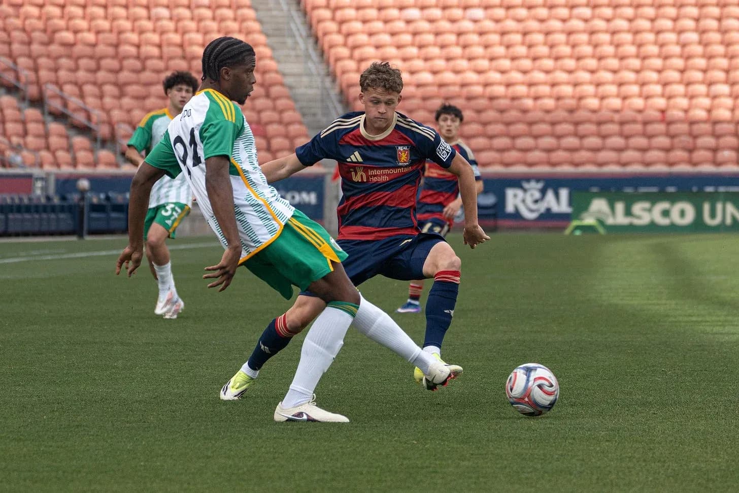 Player tackling during Portland Timbers II match
