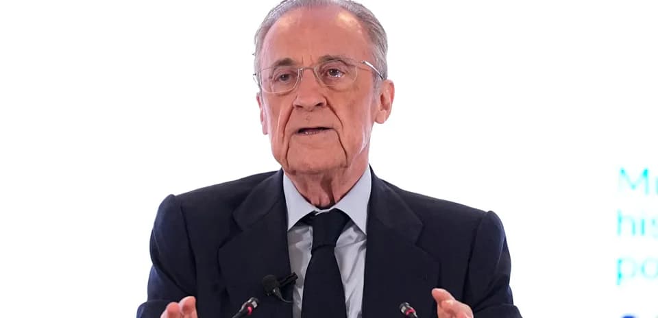Man speaking at a podium during a conference
