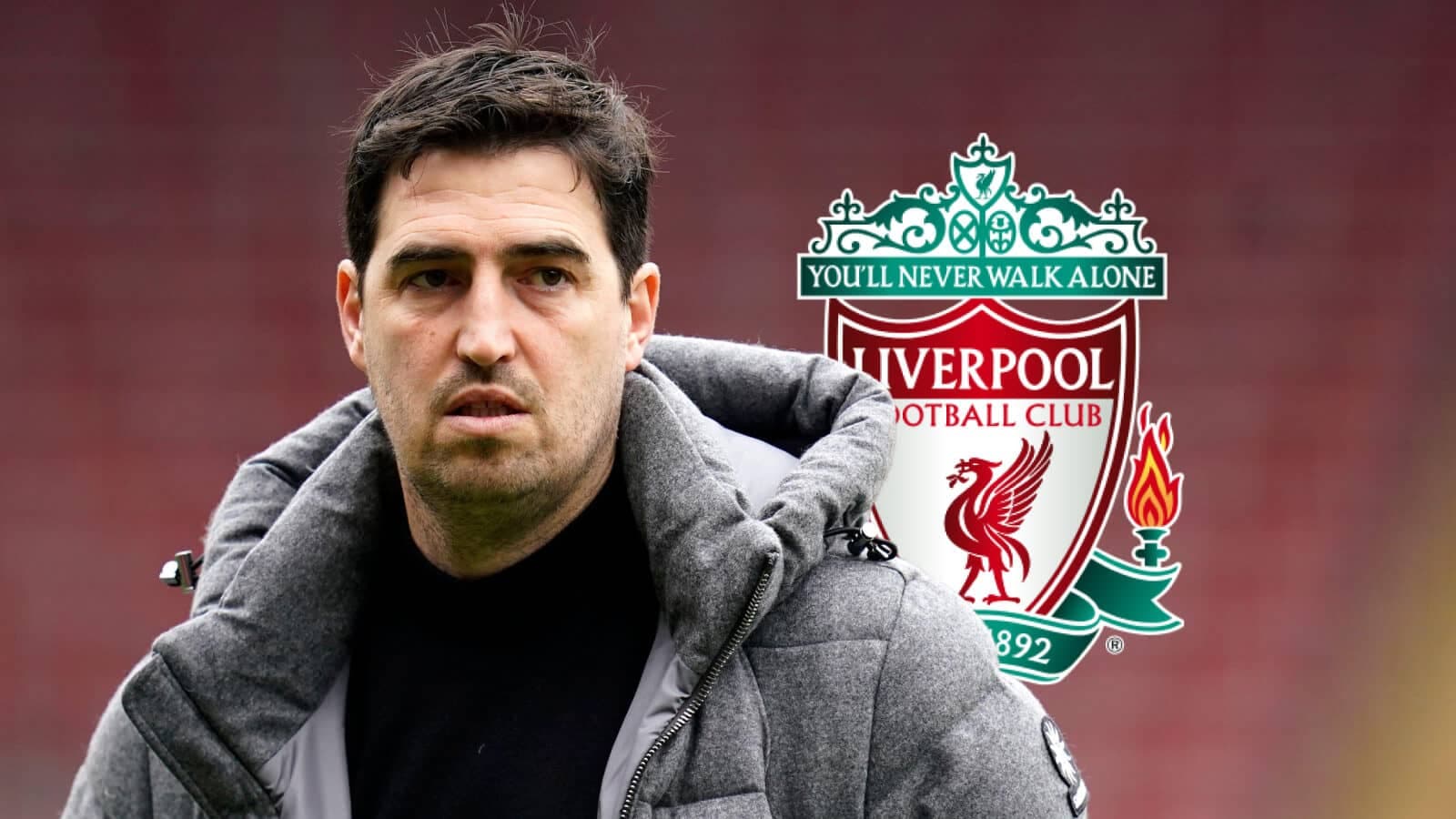 Coach in front of Liverpool FC club logo