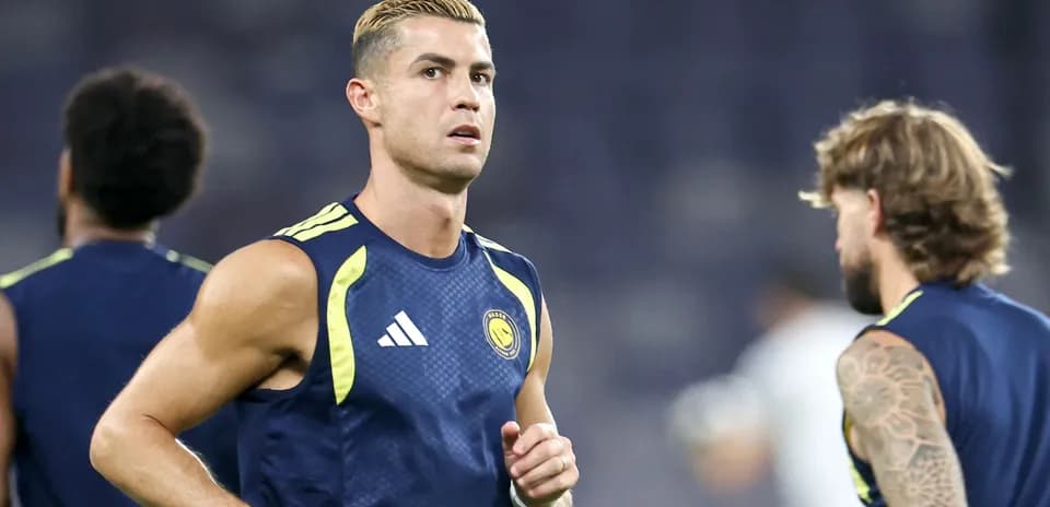 Player running during training session with teammates