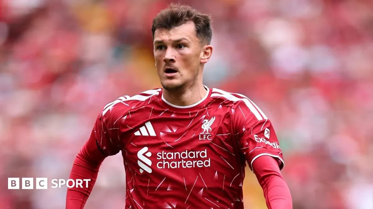 Player in Liverpool kit during match action