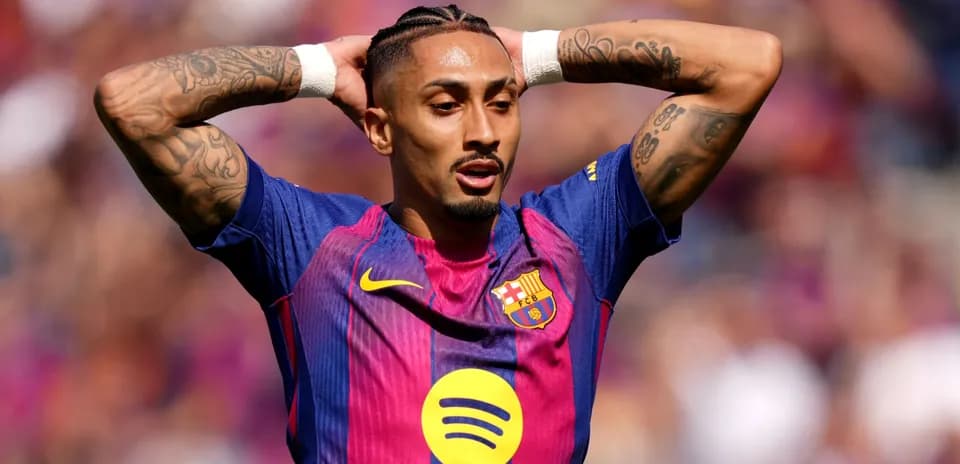 Player with tattoos celebrating during match