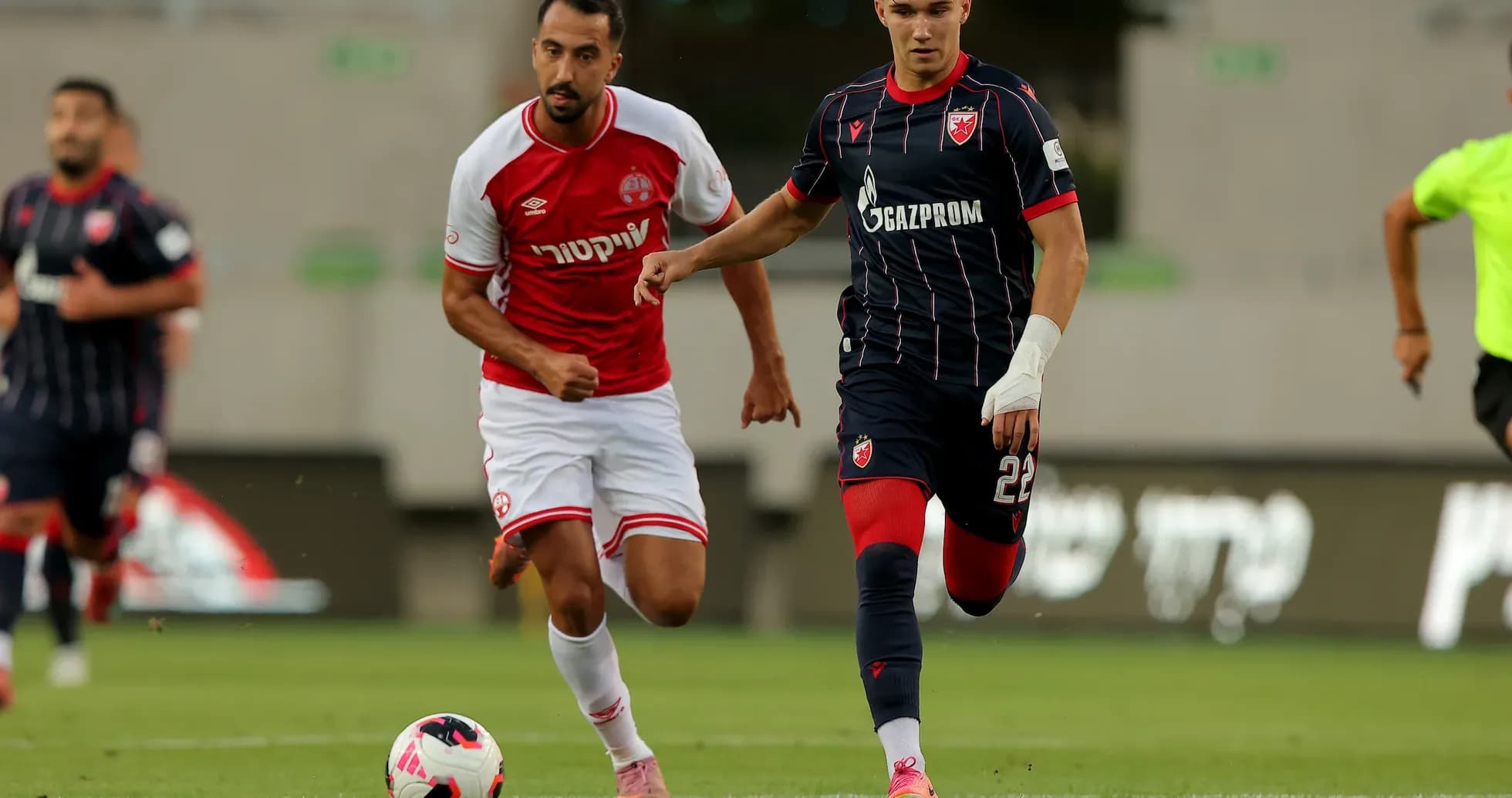 Players competing for the ball in match
