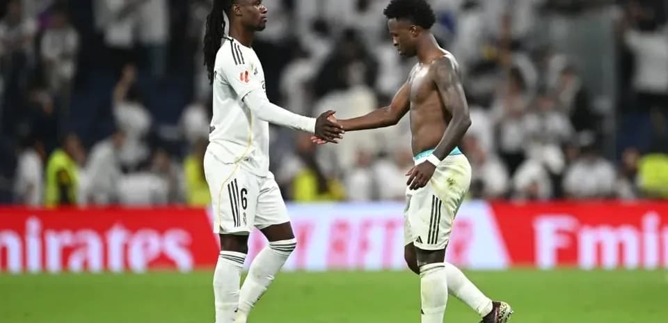Two players shaking hands after the match