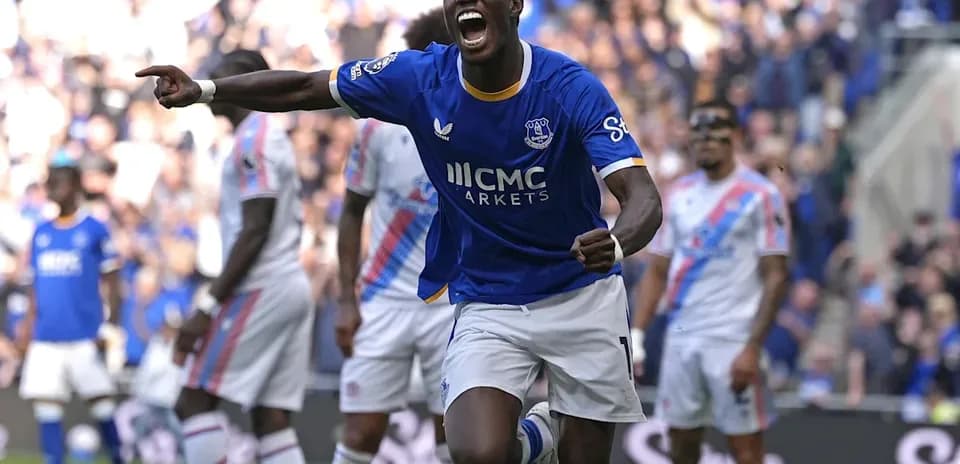 Player celebrating goal during Everton match