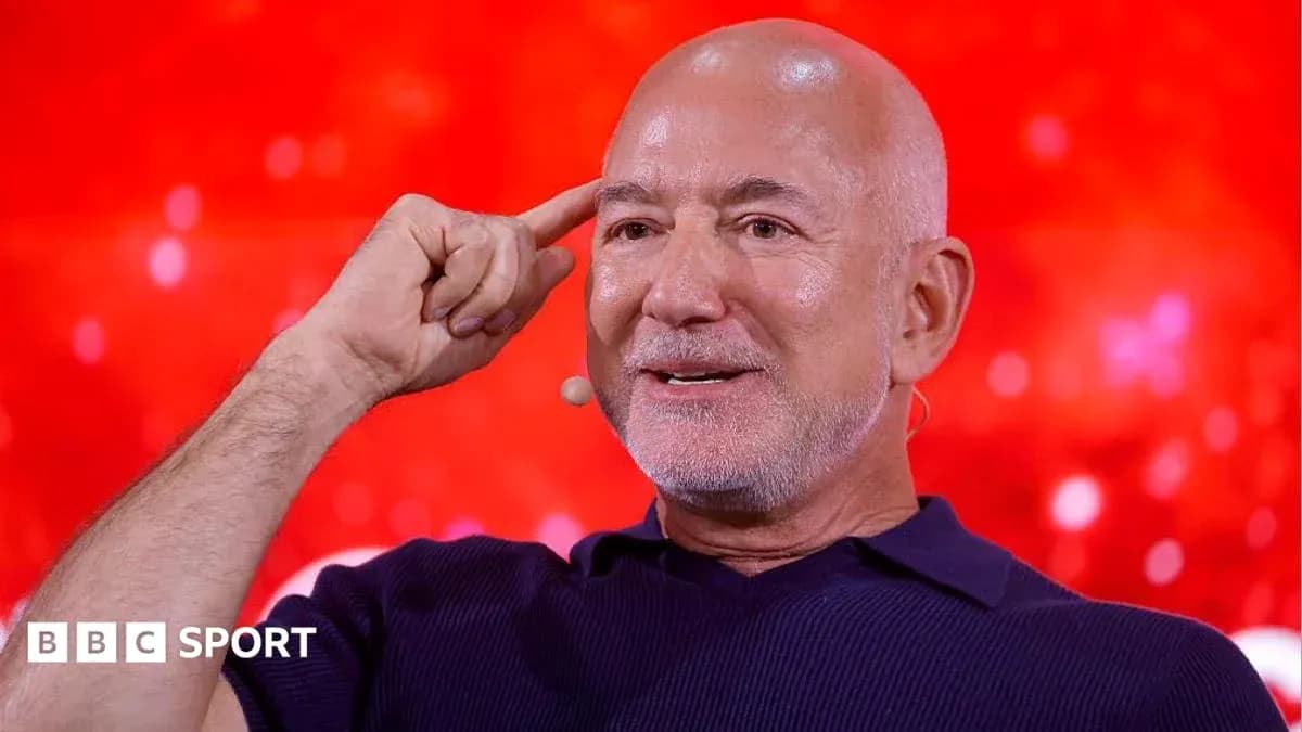 Person gesturing while speaking at event