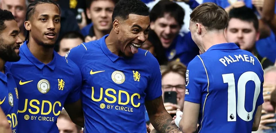 Chelsea players celebrating a goal together