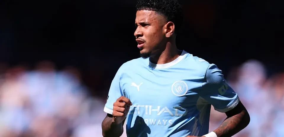 Player running on the field in light blue kit