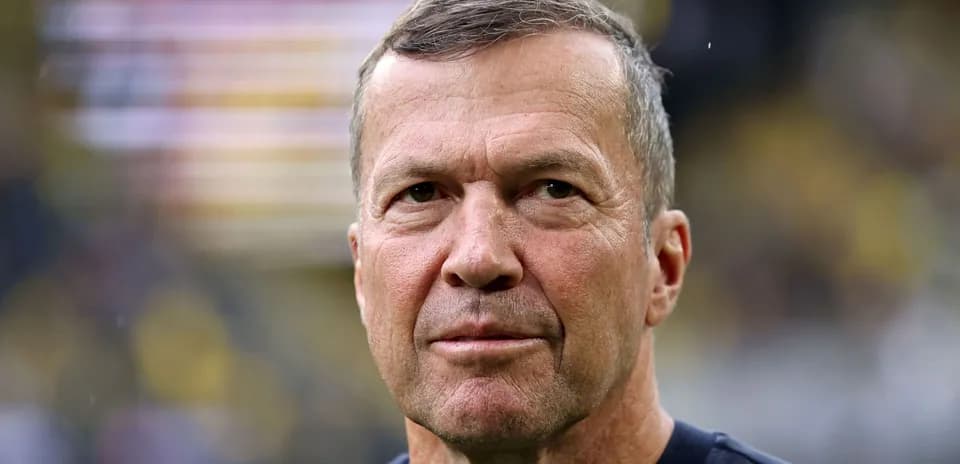 Close-up of a man with short hair outdoors