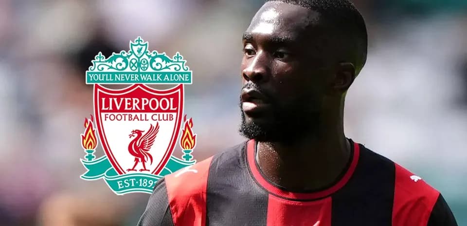 Player in red and black jersey with Liverpool logo