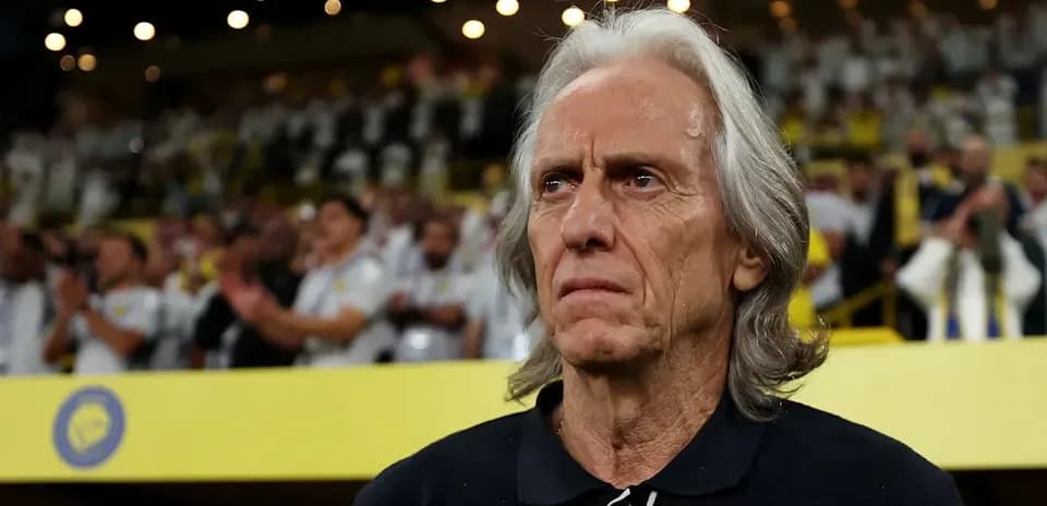 Coach observing crowd during match at stadium