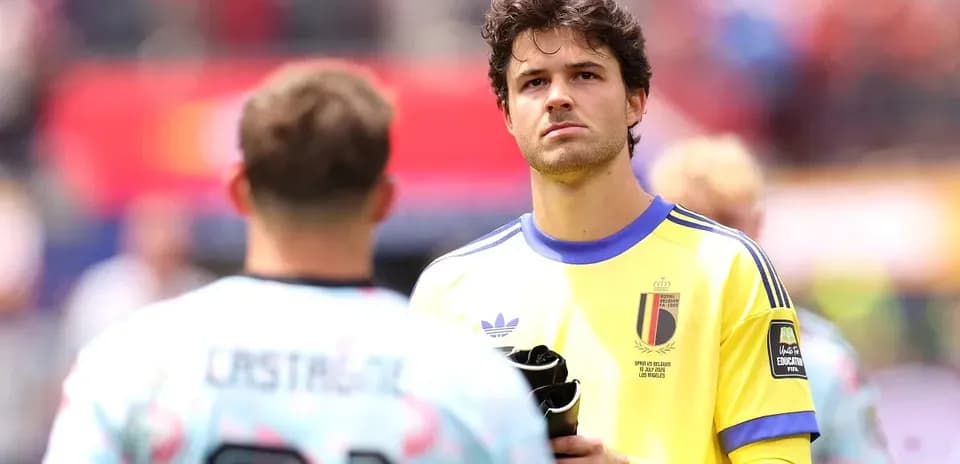 Goalkeeper in yellow jersey preparing for match