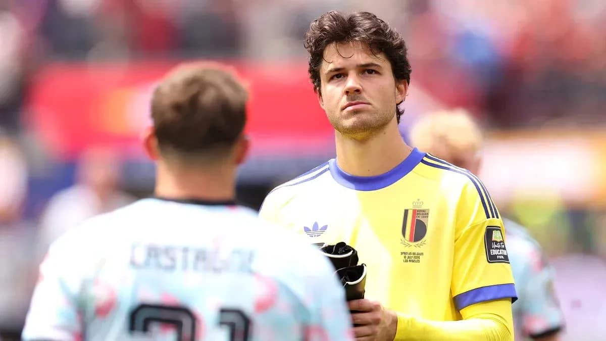 Goalkeeper in yellow jersey preparing for match