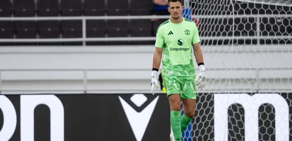 Goalkeeper in green kit during a match