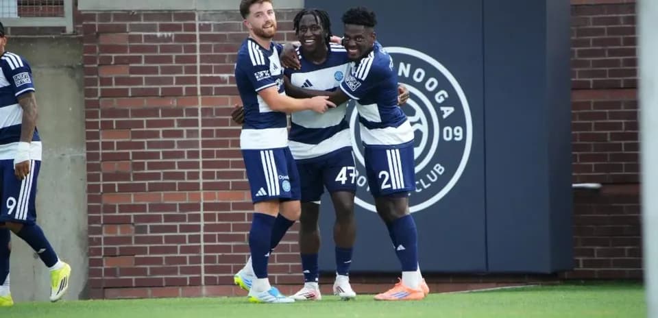 Chattanooga players celebrating a goal