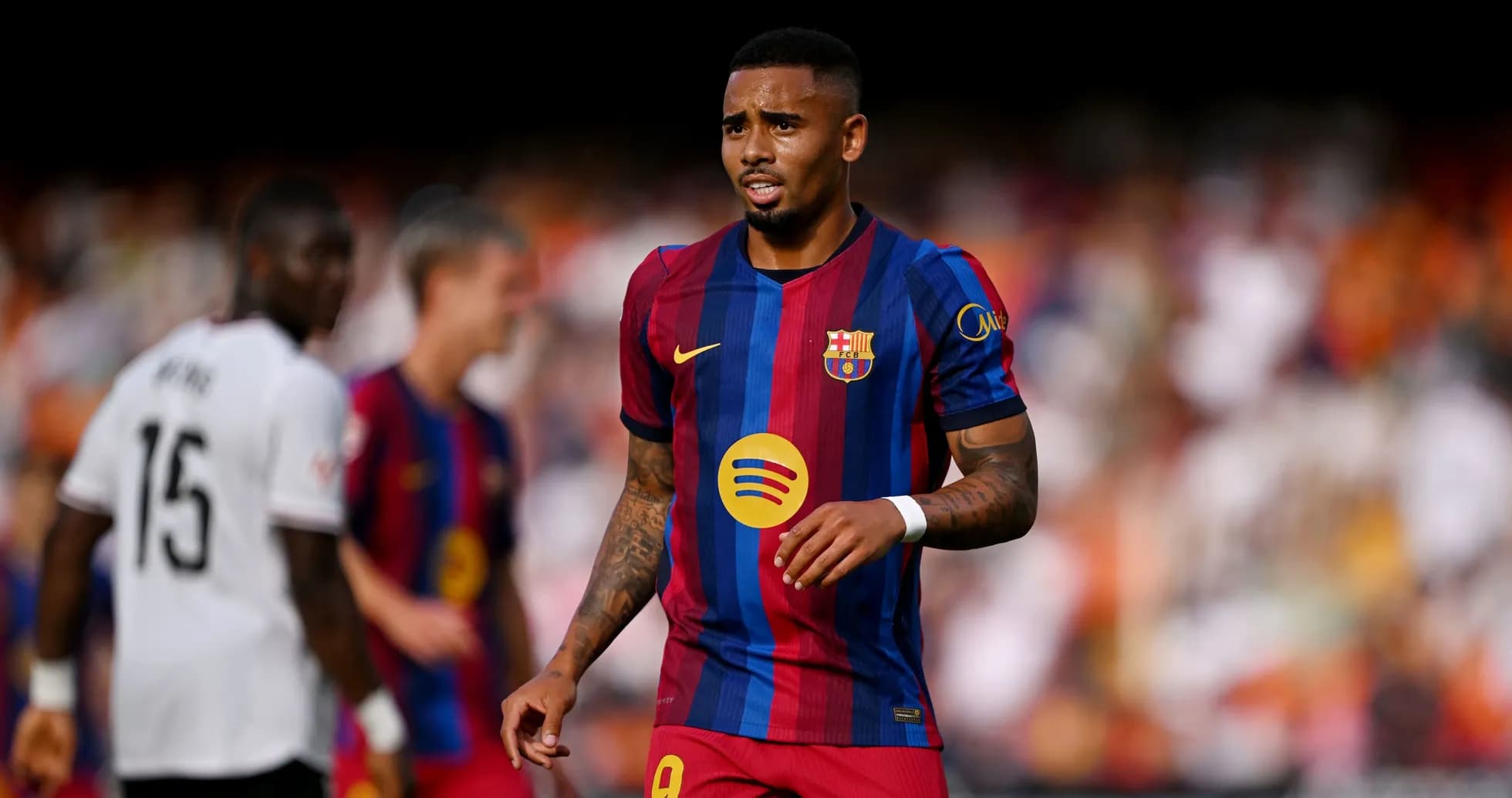 Barcelona player wearing jersey during match action