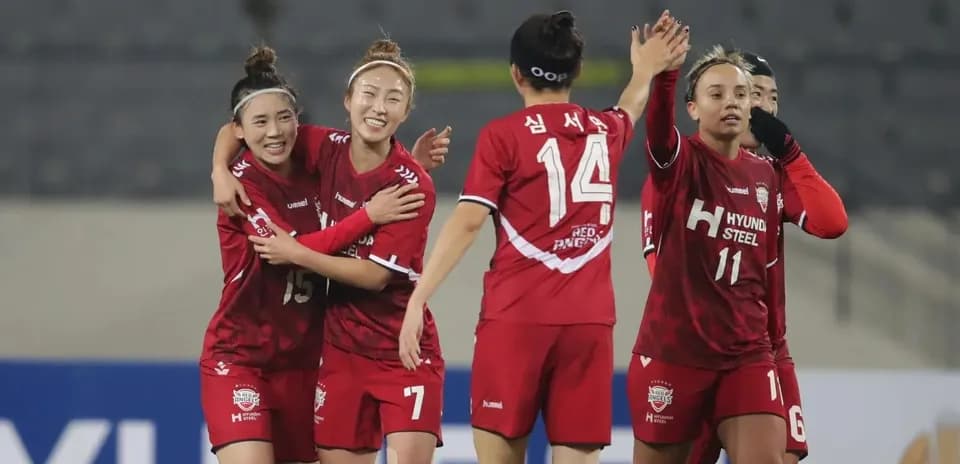 Hwacheon KSPO W players celebrating a goal