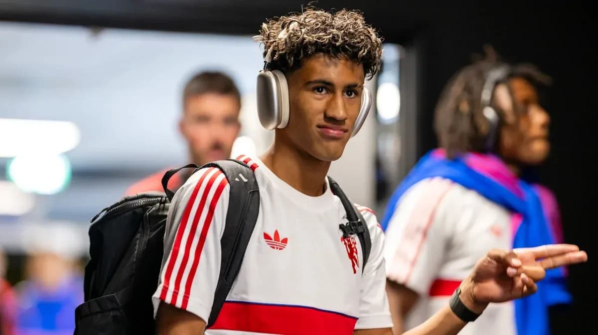 Player wearing headphones entering the stadium