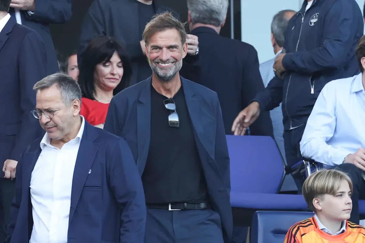 Jurgen Klopp smiling in a crowd at event