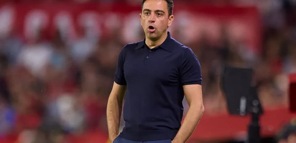 Coach gesturing during a football match