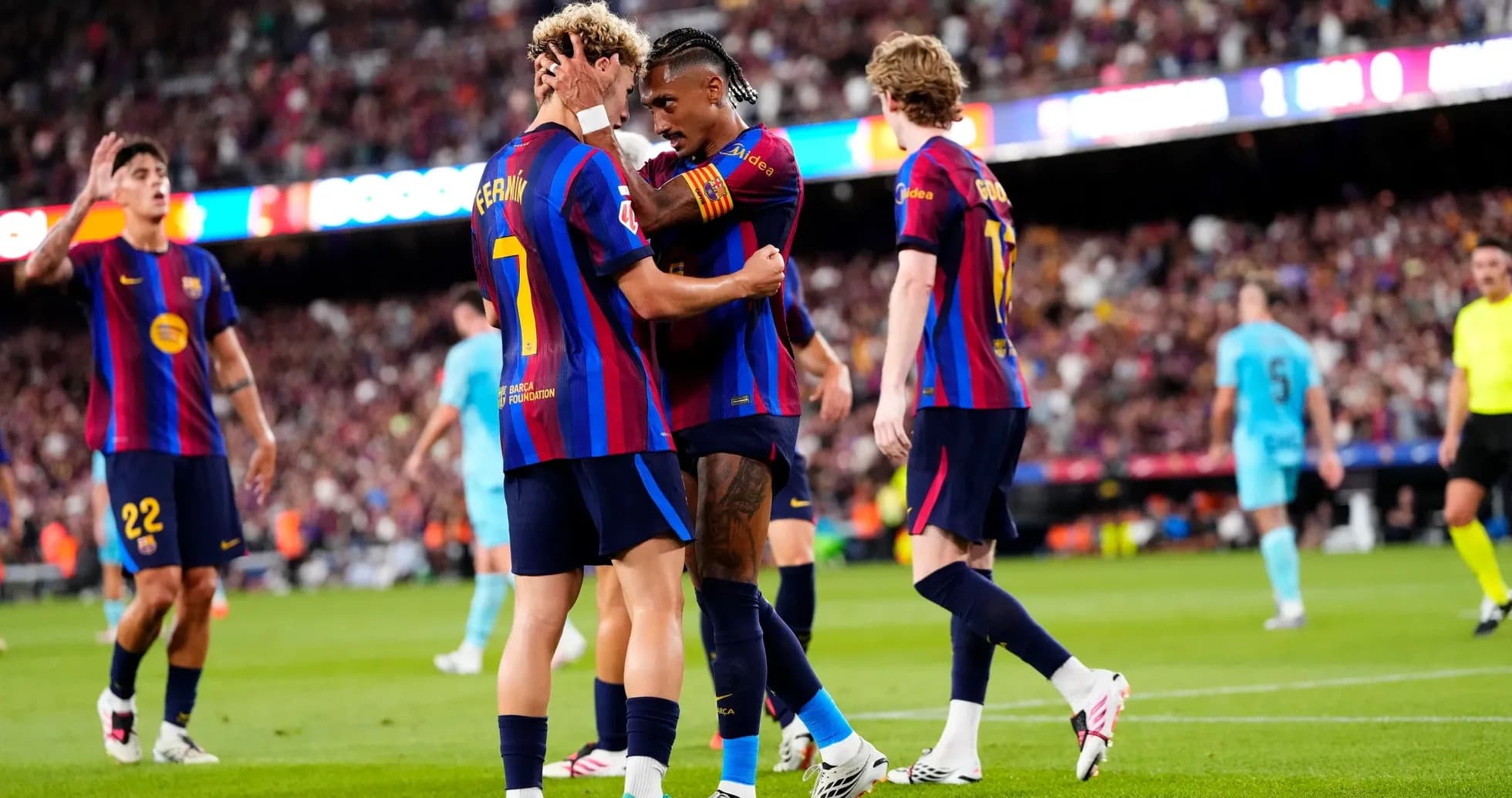Barcelona players celebrating a goal during match