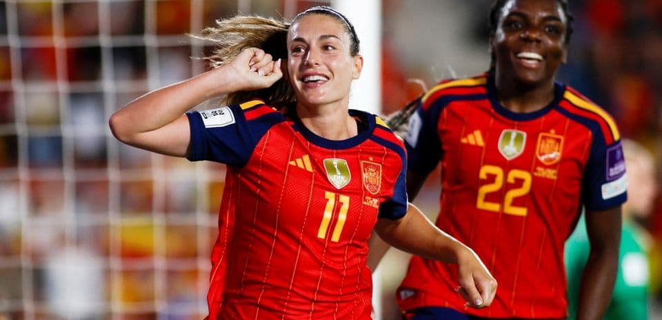 Spain players celebrating a goal during match