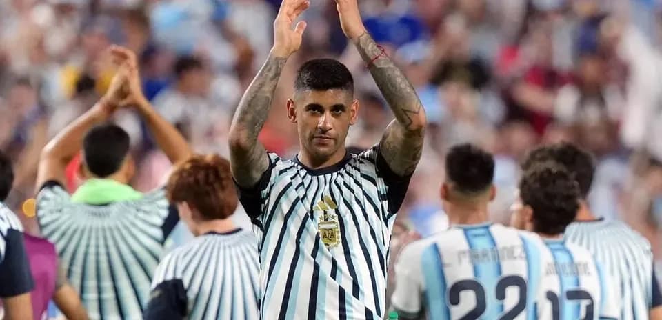Player applauding fans after a match