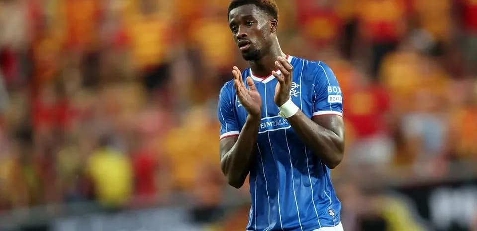 Rangers player applauding fans after match