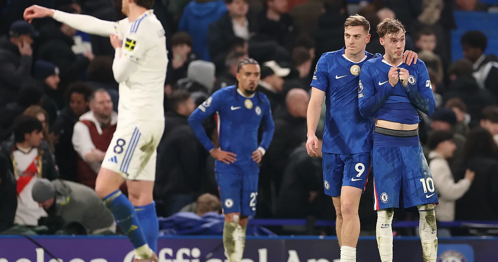 Chelsea players reacting after a match defeat