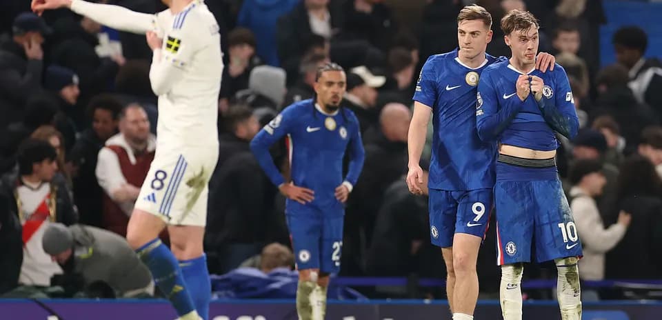 Chelsea players reacting after a match defeat
