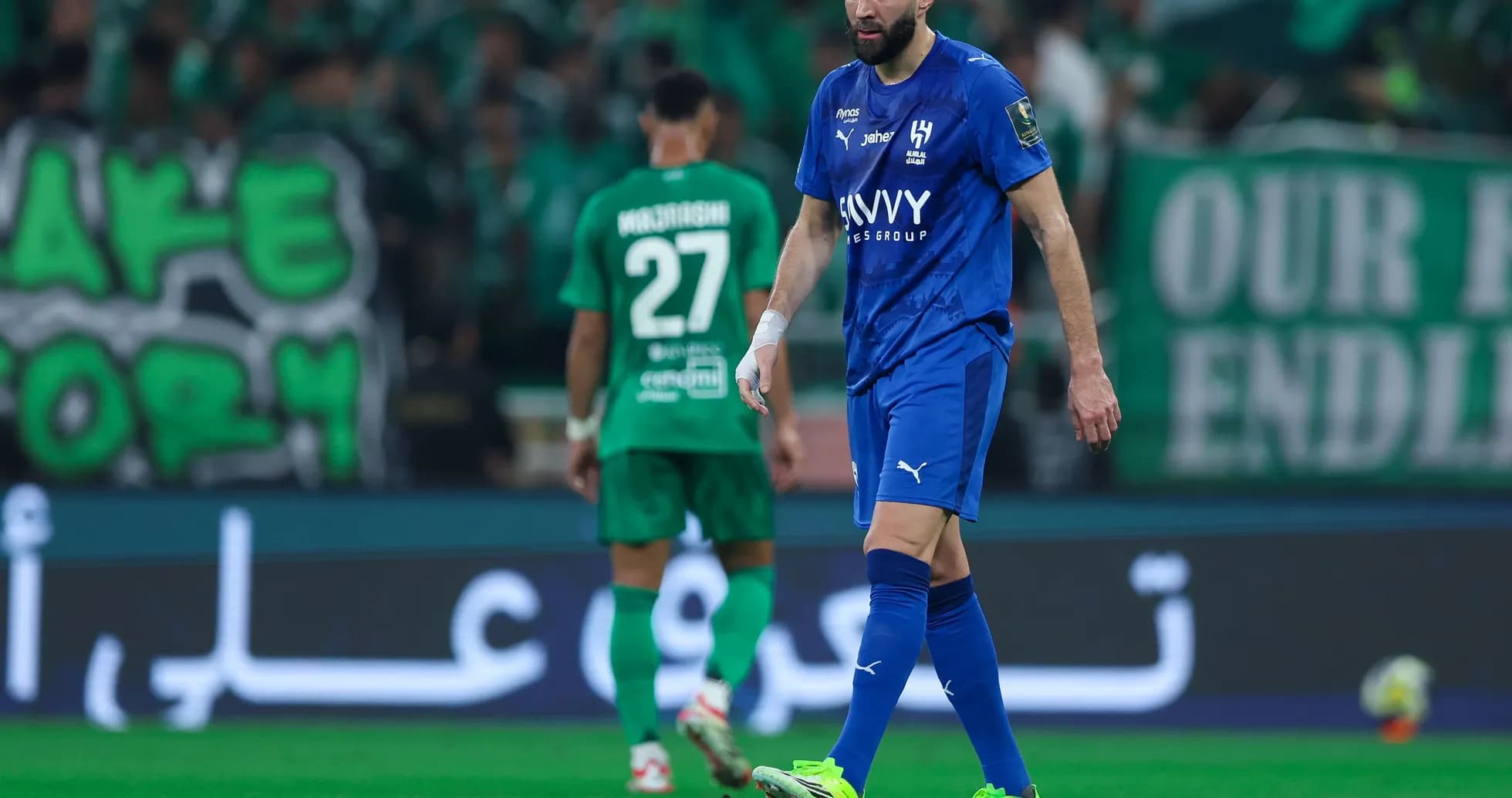 Two players on the field during a match