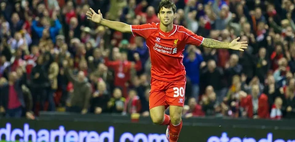 Player celebrating a goal in Liverpool kit