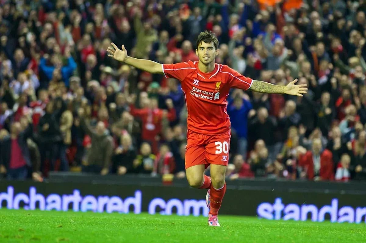 Player celebrating a goal in Liverpool kit
