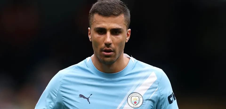 Player wearing Manchester City training kit on field