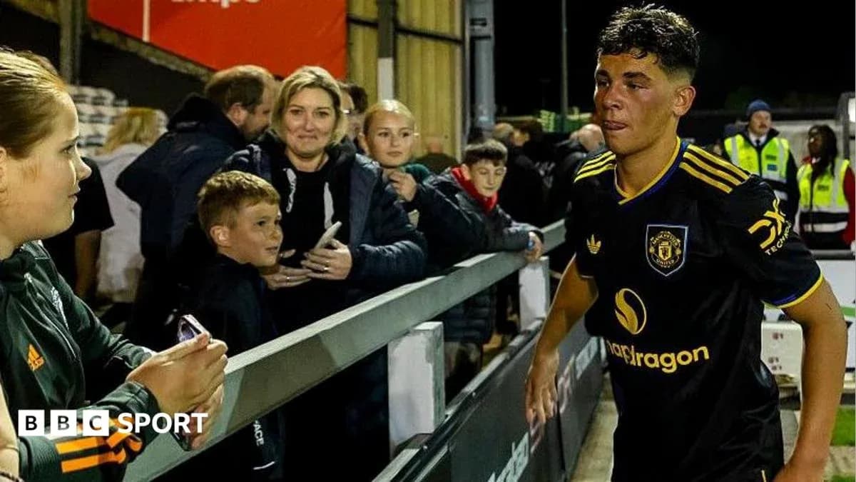 Player walking past fans after match