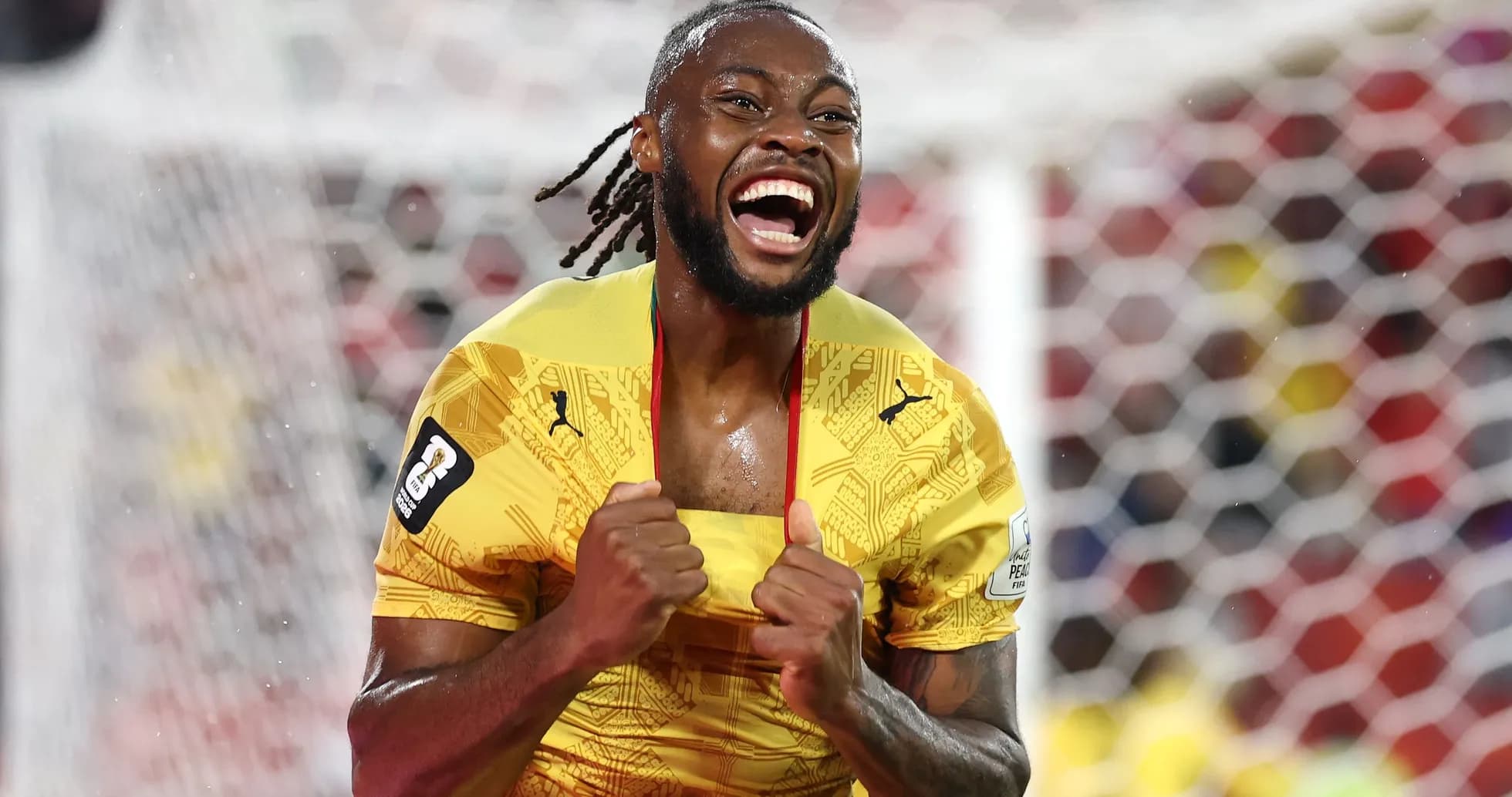 Player celebrating a goal in yellow jersey