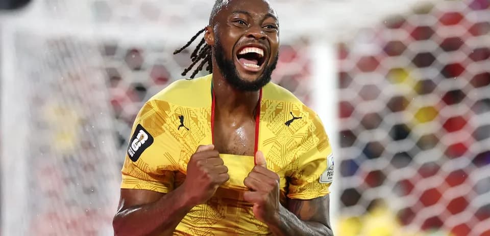 Player celebrating a goal in yellow jersey