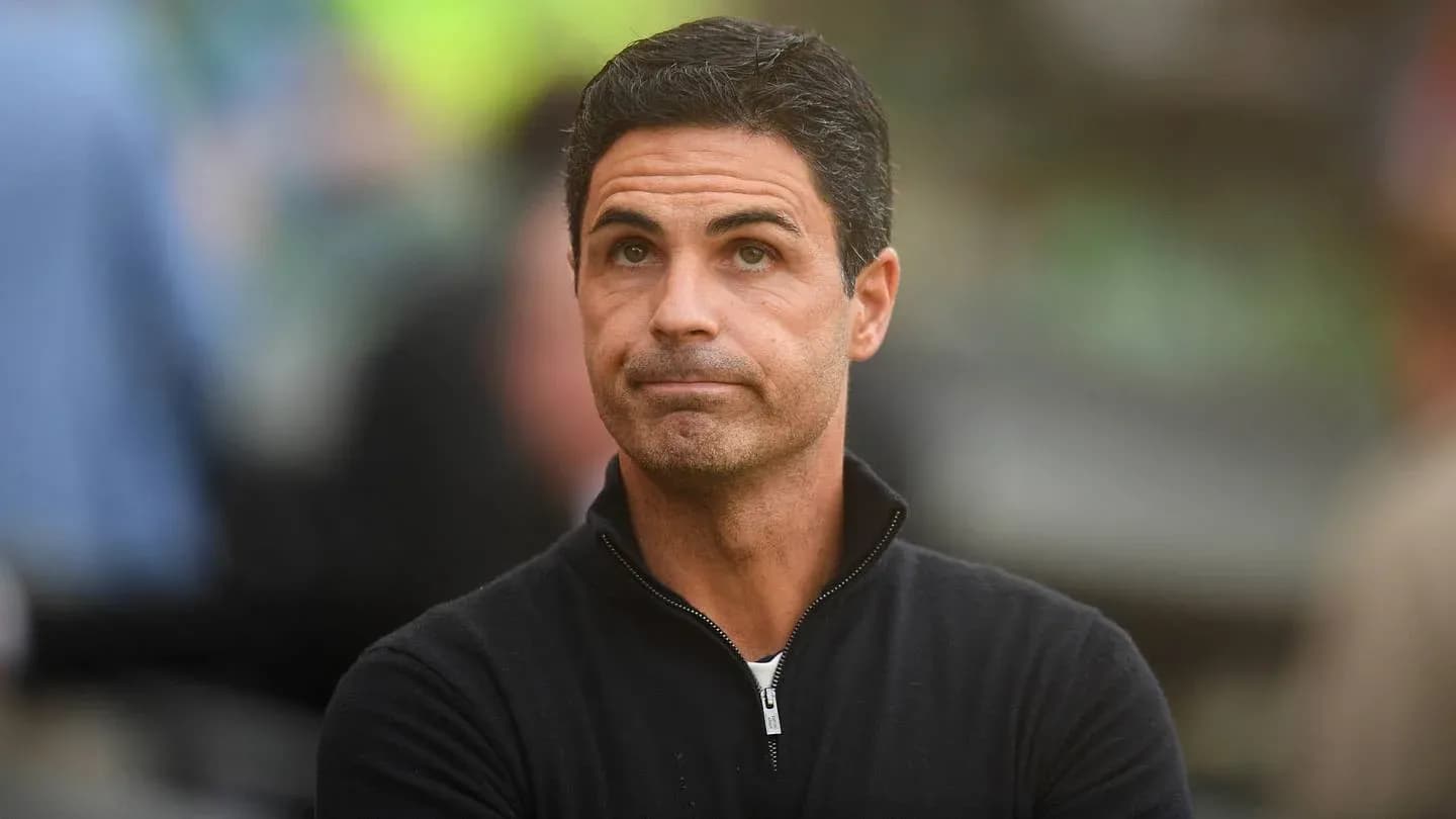 Football manager observing the match from sidelines