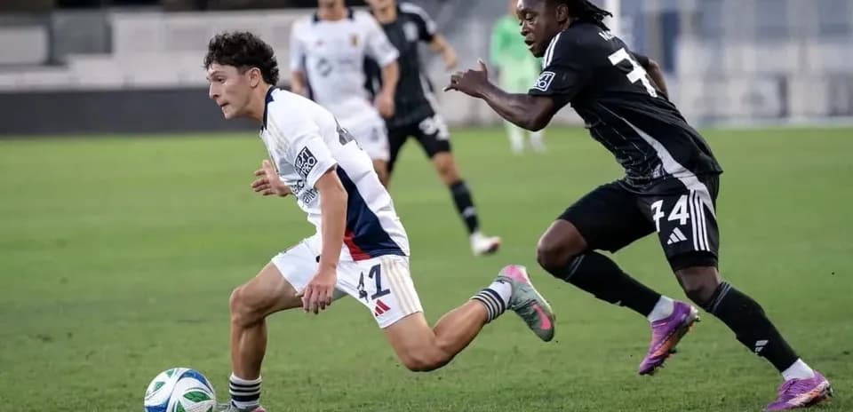 Player dribbling the ball during MLS Next Pro match