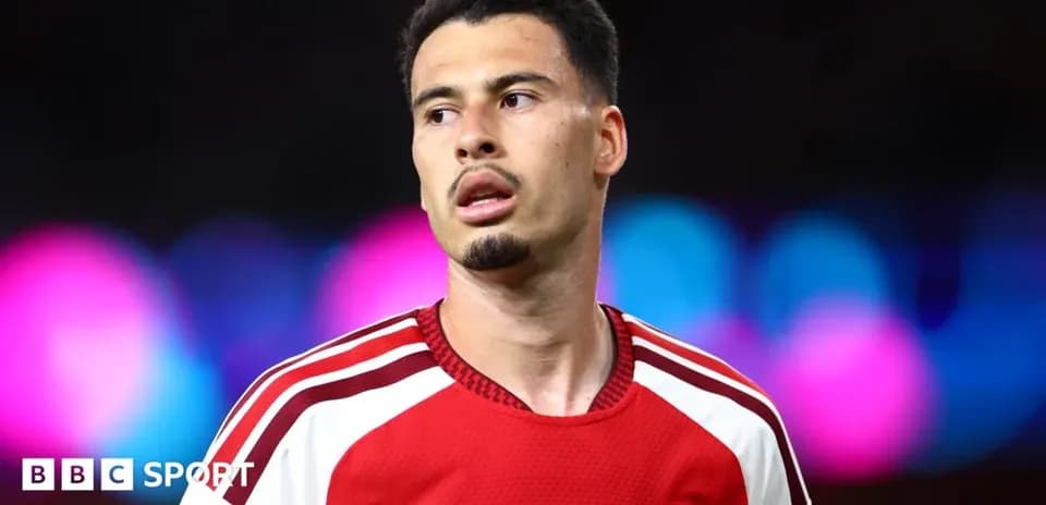 Arsenal player during match, focused on game
