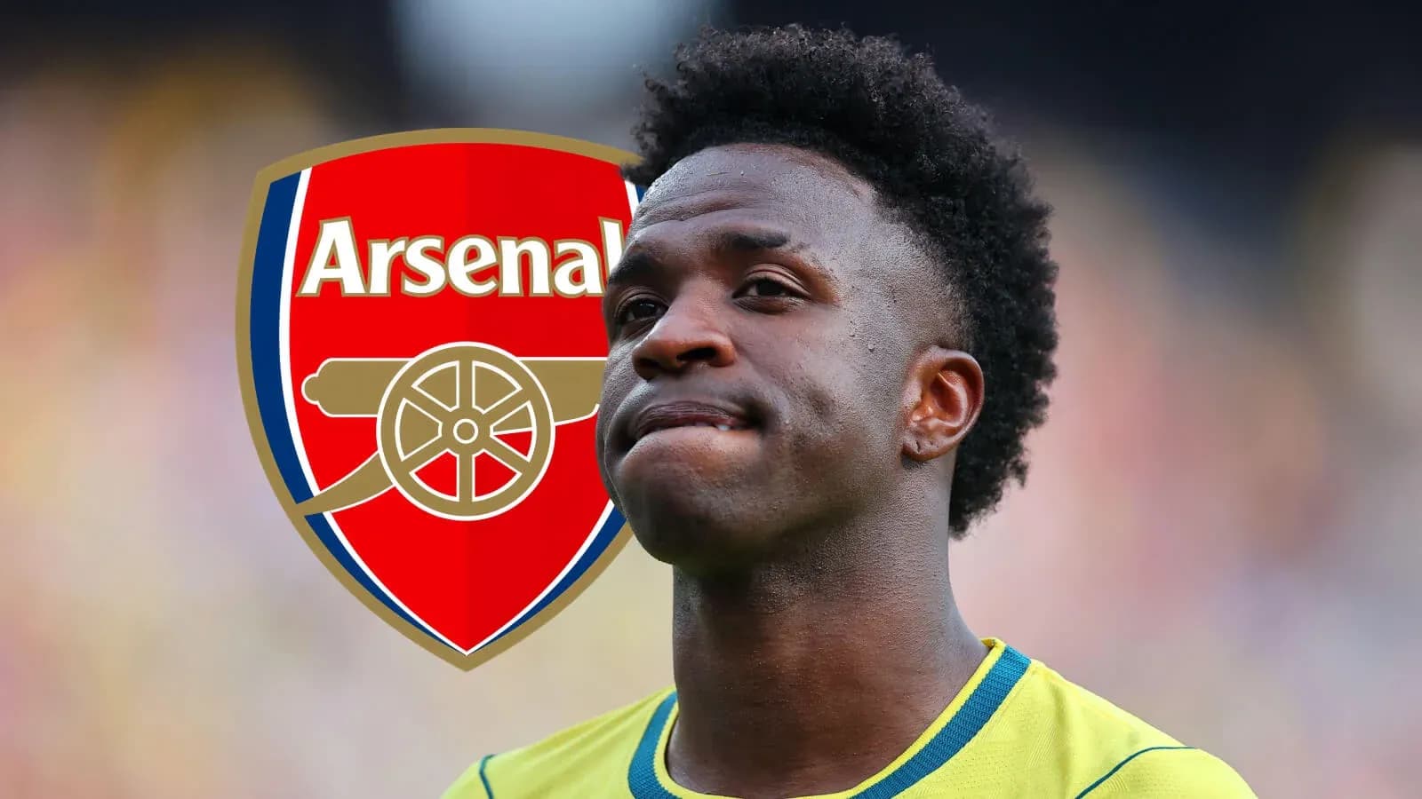 Player in Arsenal jersey with club logo background